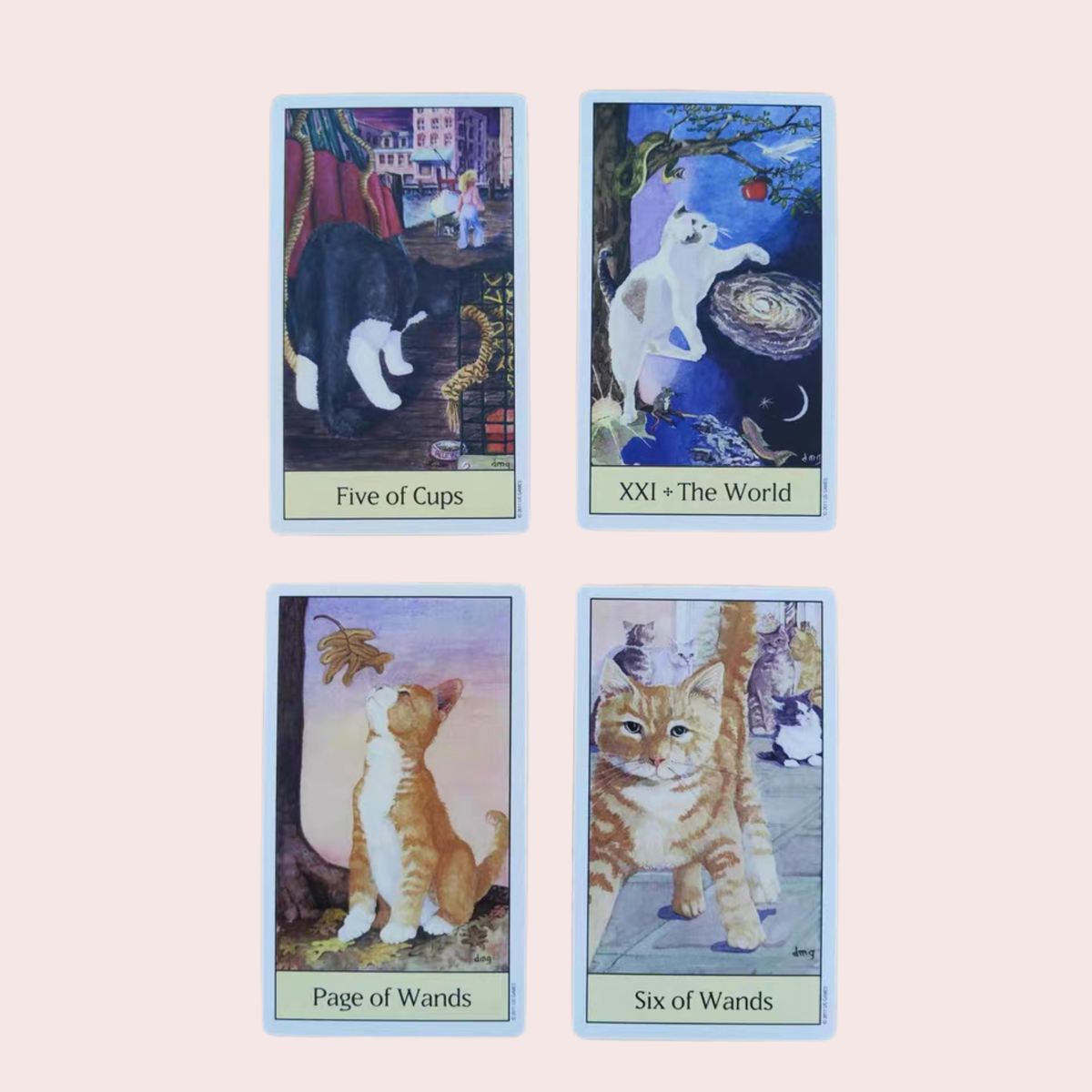 Cuatro cartas del Tarot Cat's Eye ilustradas con gatos