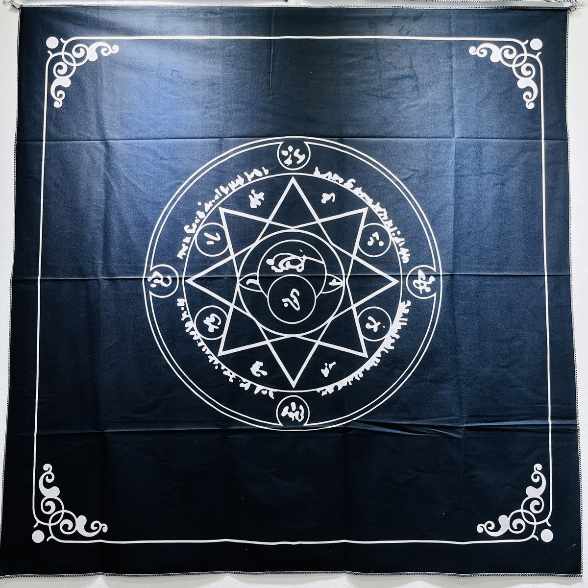 Paño de tarot Estrella de Siete Puntas, azul oscuro con círculo central y esquinas decoradas