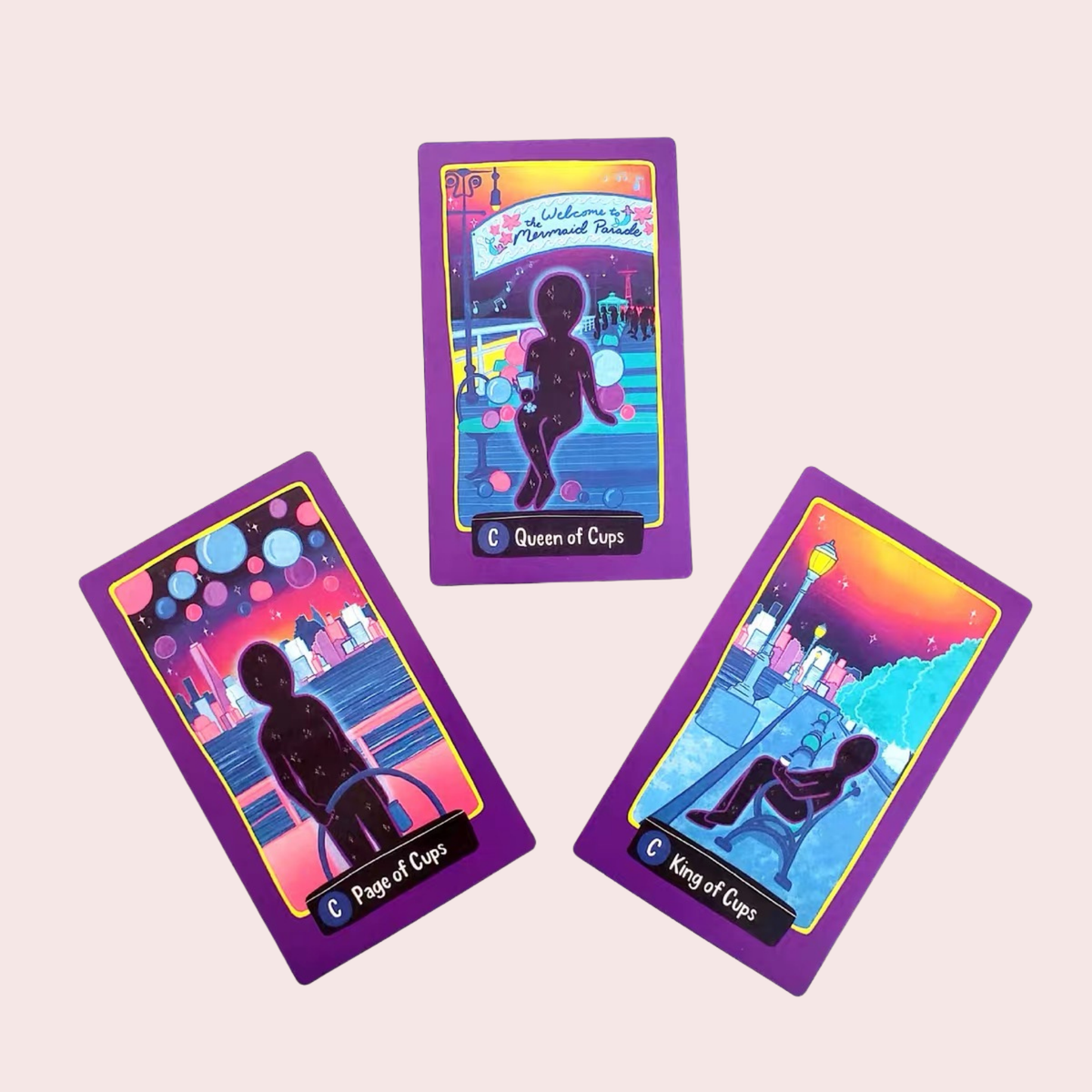Tres cartas del Tarot Midnight City en rosa, morado y azul